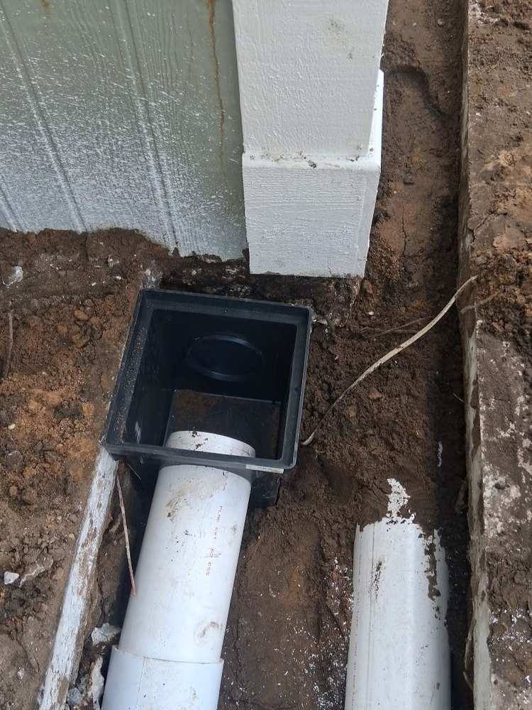 PVC Drain Pipe Installation by PMH French Drain Contractors