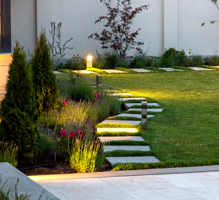 stone walkway and landscape on a yard